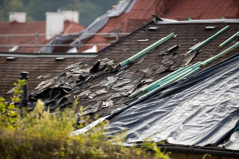 Storm Damage Roof Tarping in Arvada, CO